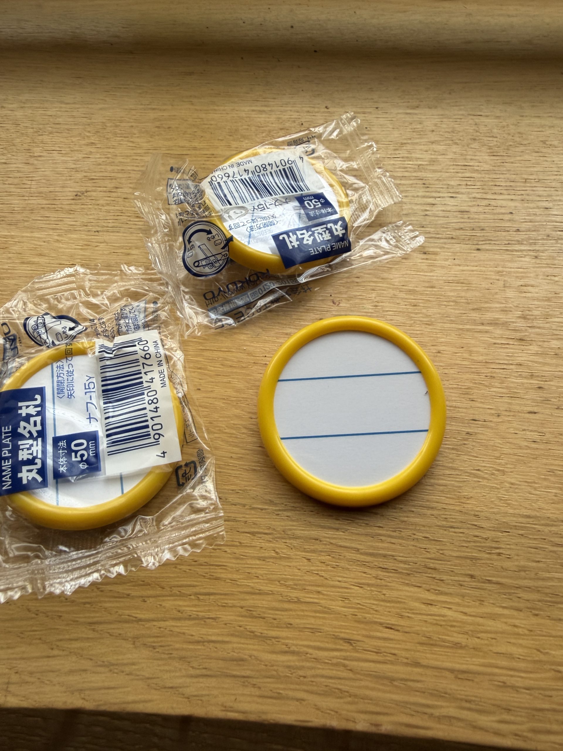 丸ﾋﾞ会の名札の意味...